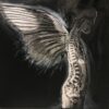 painting of a profile silhouette-seing the spine with wings in the back