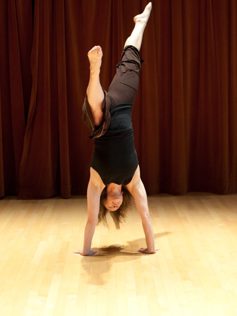 Christine Germain doing a handstand